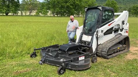 how to put a bobcat skid steer in float|floating bucket on bobcat.